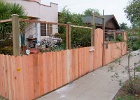Dog-ear fence with welded wire on the top.JPG