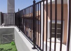 Regal iron fence top of the wall.JPG