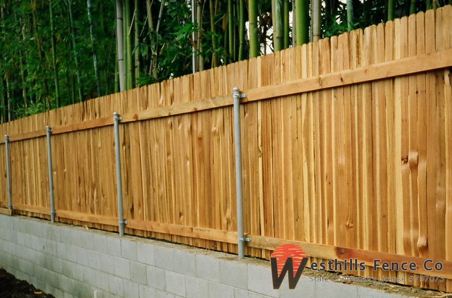 Grapestake fence with steel posts