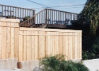 Custom wood fence on the top of the wall.jpg