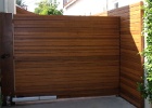 Horizontal 1x4 redwood fence.JPG