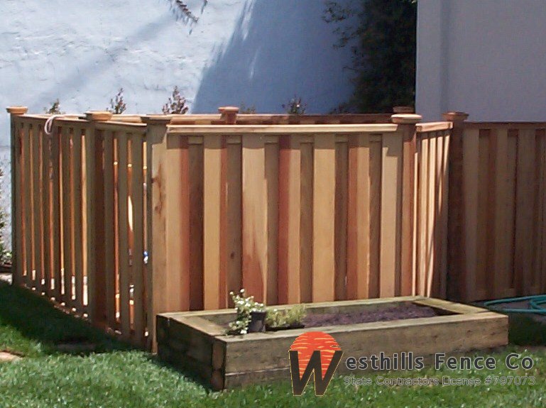 Alternating board fence with 2x4 cap