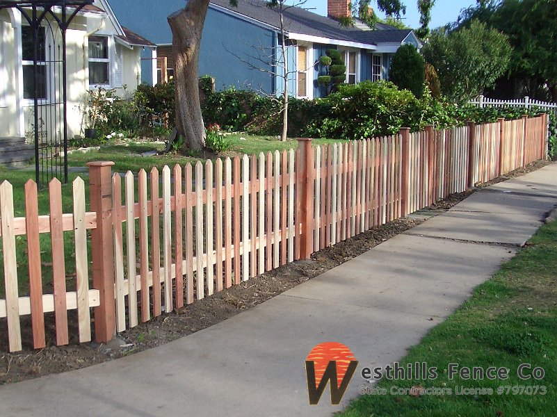 Exposed pointed picket fence