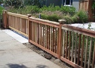 2x2 redwood picket fence with sliding gate.JPG