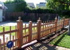 2x2 redwood picket fence.JPG