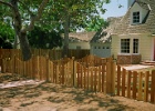 Scoop 1x6 redwood picket fence with ball.jpg