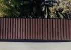 Aristocrat iron fence with solid metal.jpg