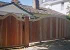Custom tongue and groove with arch gates.jpg